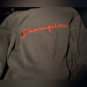Champion Olive Sweatshirt with Vibrant Orange Logo